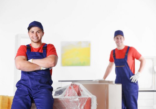 Team member reviewing ethical labour compliance at Man With Van Bickley