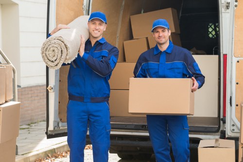 Removal van and moving boxes outside a residential house in Bickley