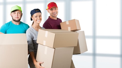 Packed office files and furniture ready for transport