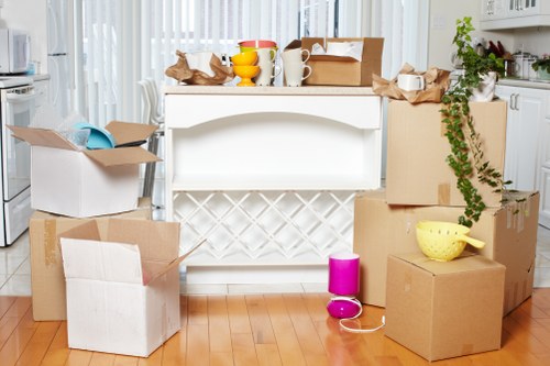 Furniture and boxes being arranged in a removal van