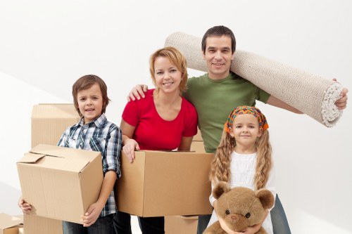 Moving team loading household items with care near Bickley