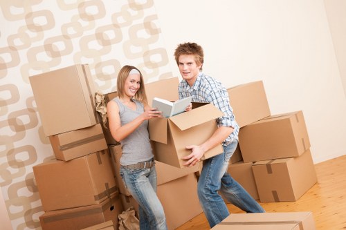Local moving team loading boxes and furniture for transport