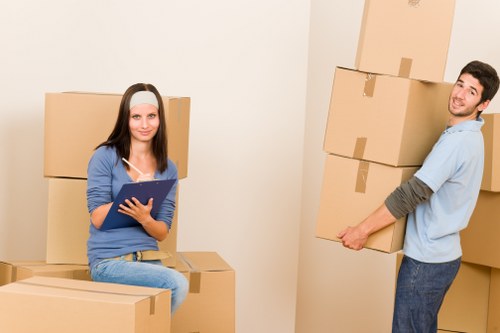 Furniture and boxes being arranged for secure transit