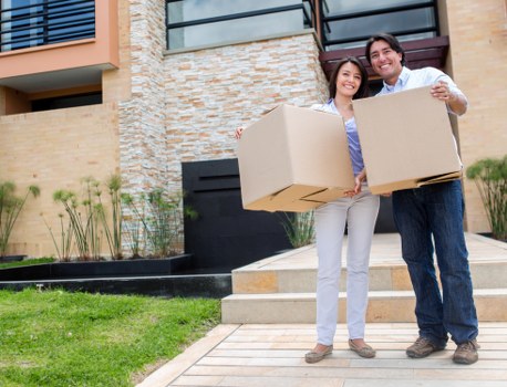 A neatly organised moving day with labelled boxes and family home items